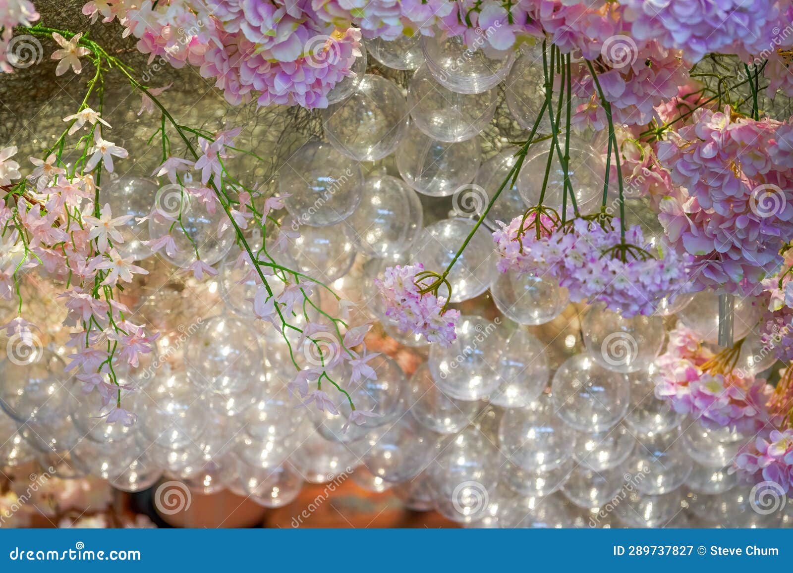 Modern Wedding Scene with Balloon Bubbles and Purple Ceiling Flowers