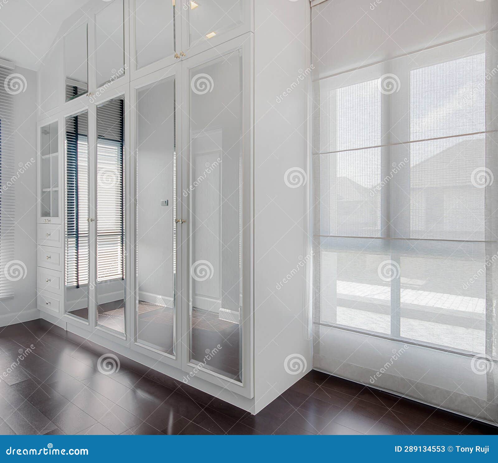 Modern White Built-in Wardrobe of Bedroom Interior Stock Image - Image