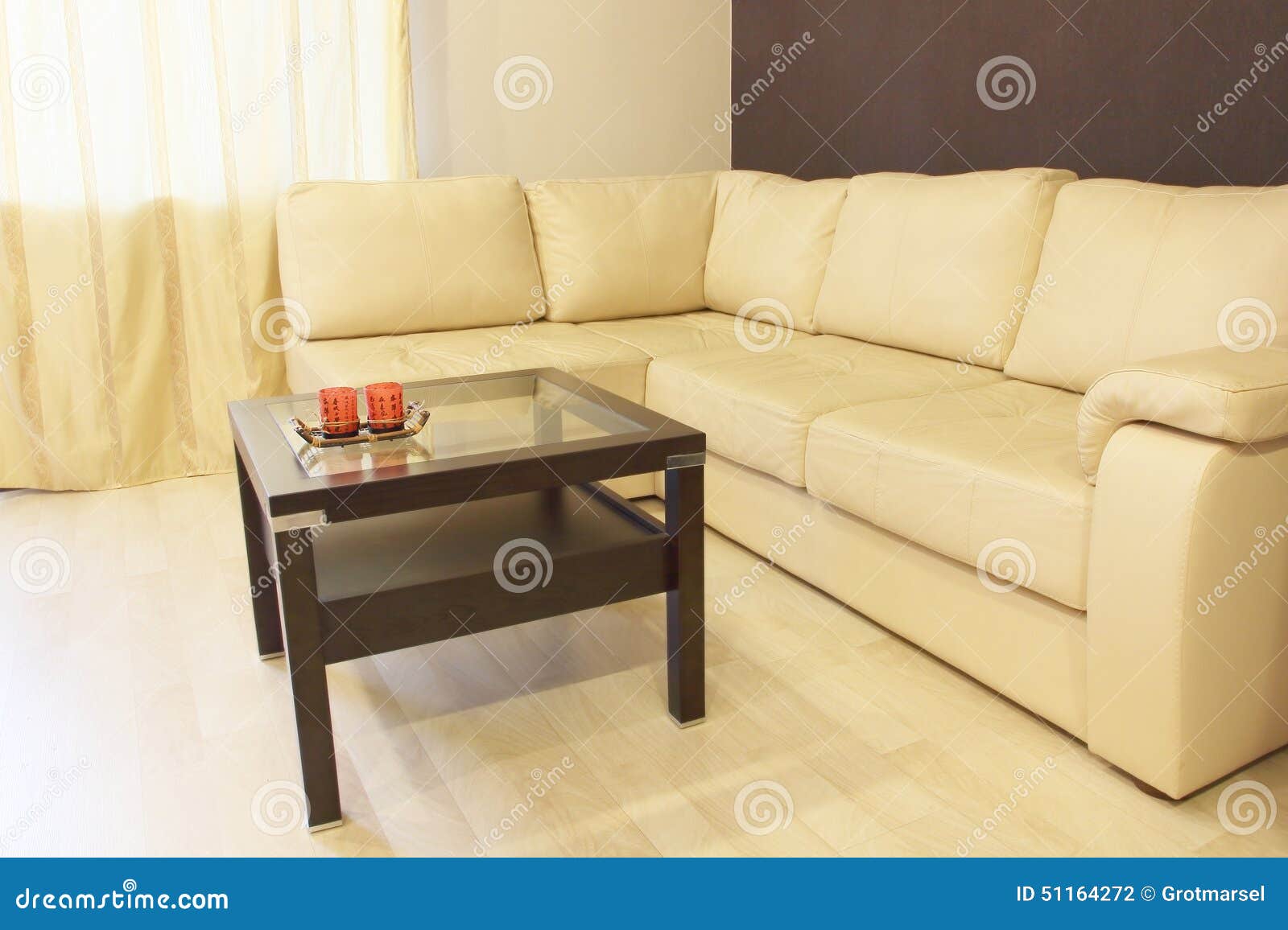 Modern White Corner Leather Sofa and Coffee Table. Stock Photo Image