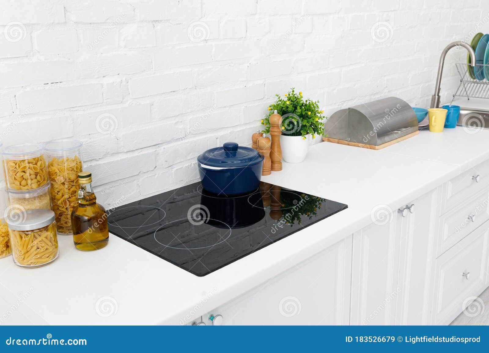 Modern White Kitchen Interior with Kitchenware Stock Image Image of