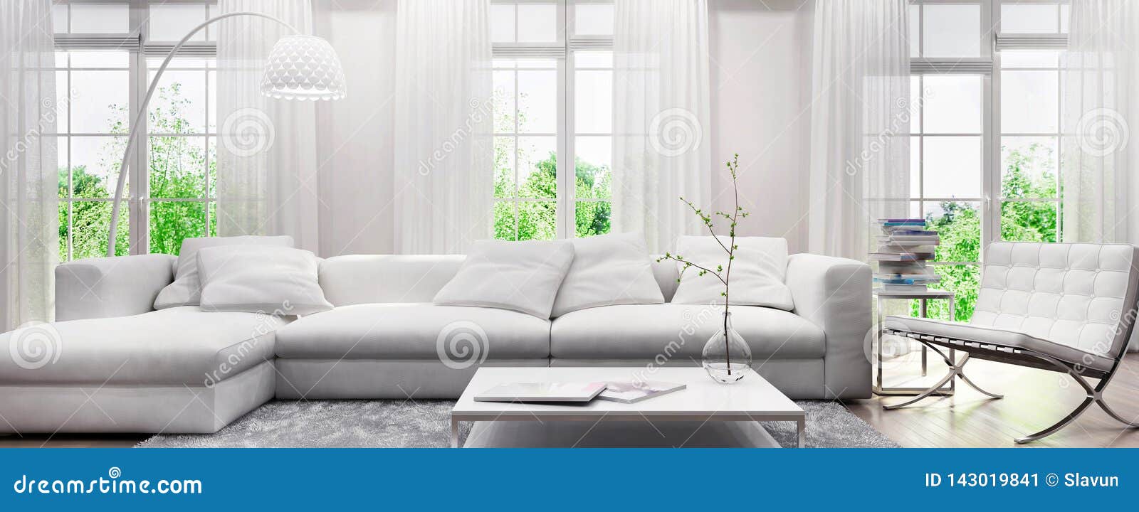 modern white interior with a sofa and large windows