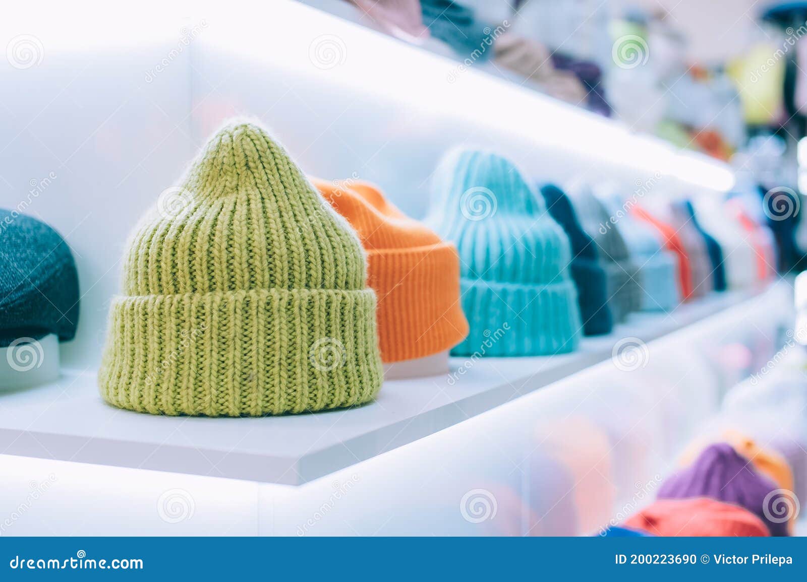 Modern Winter Hats on a Showcase in a Supermarket Stock Photo Image