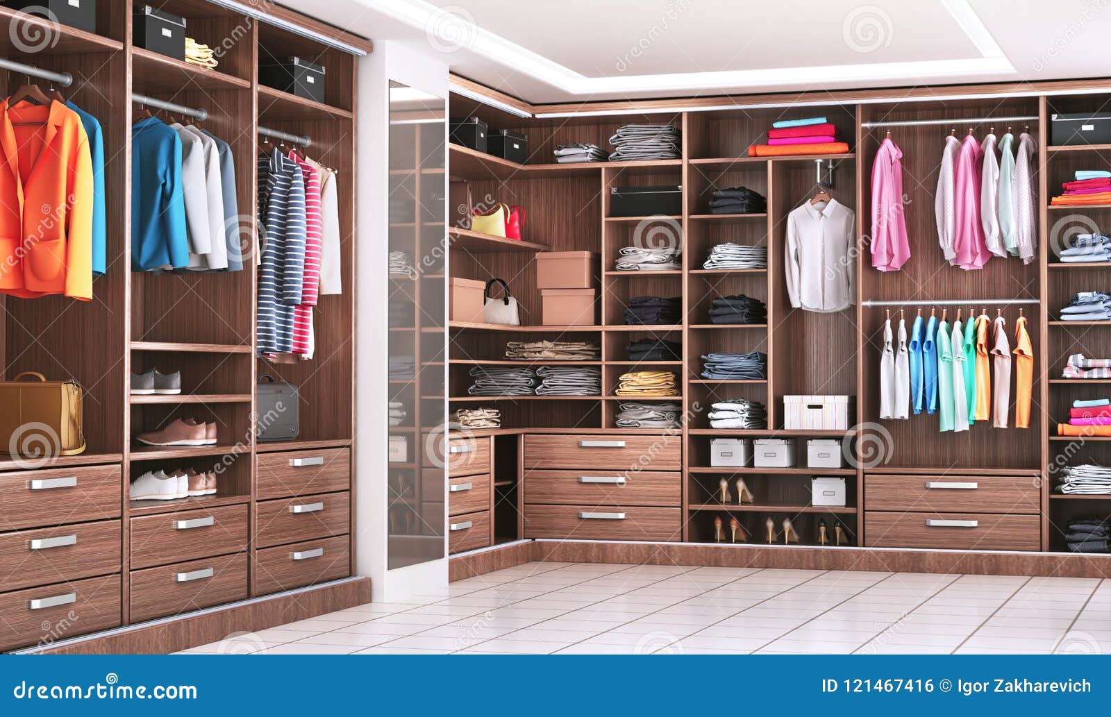 modern wooden wardrobe with clothes hanging on rail in walk in closet  interior.