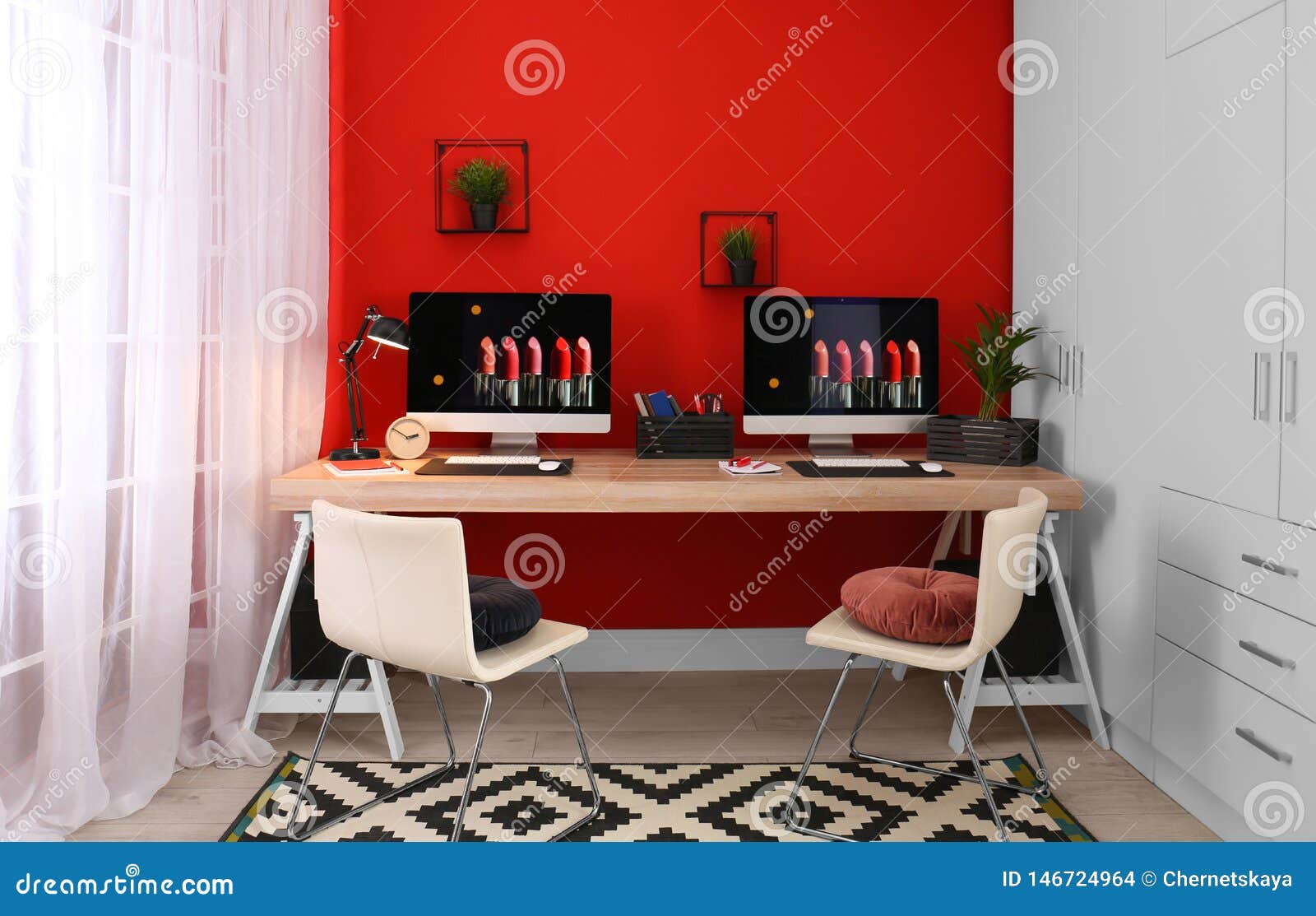 Modern Workplace with Large Desk and Computers. Stylish Interior Stock