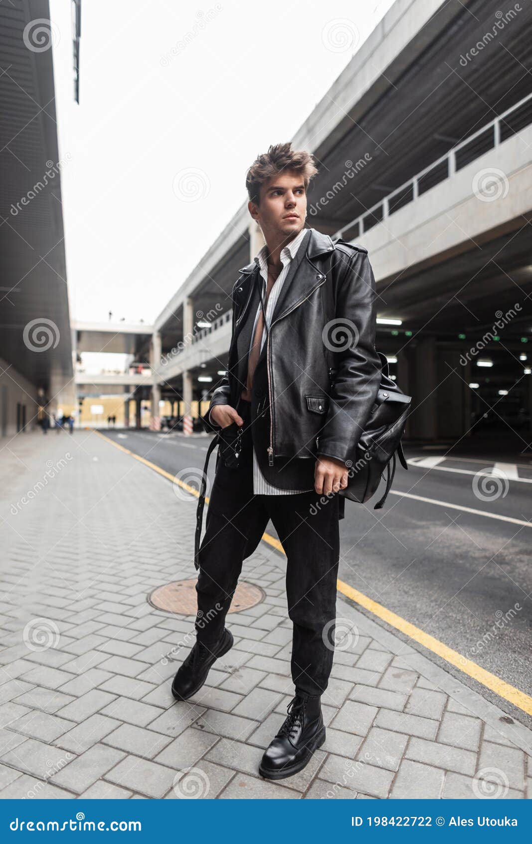 Young Man in Leather Jacket Poses with a Purse Stock Image - Image of  dreamboat, jacket: 122032083