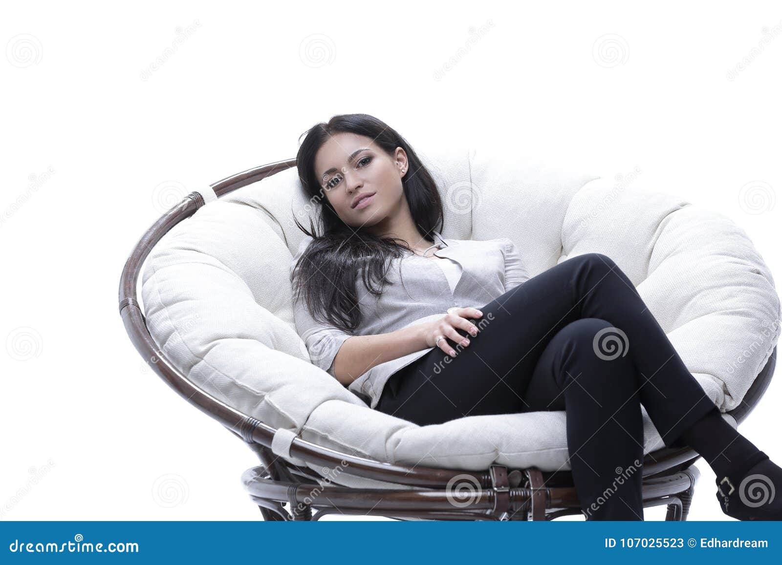 Modern Young Woman Sitting In A Round Cozy Soft Chair Stock Image 