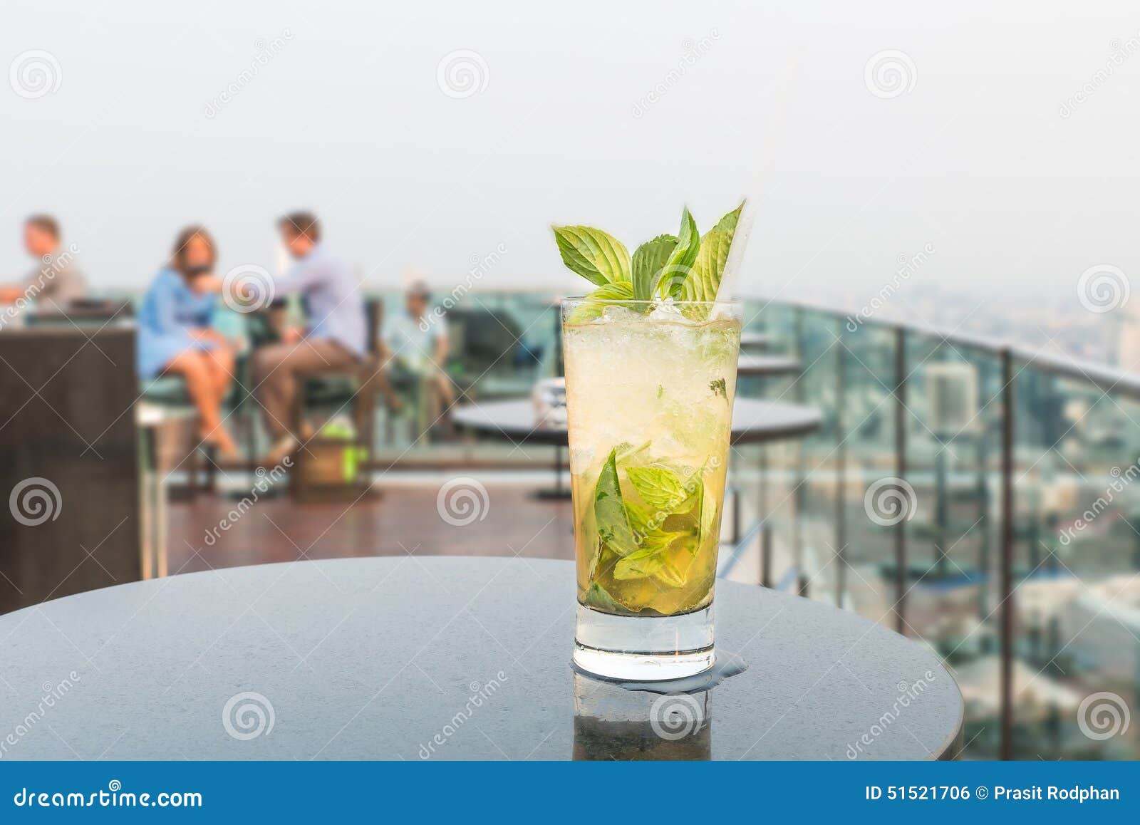 mojito cocktail on table in rooftop bar