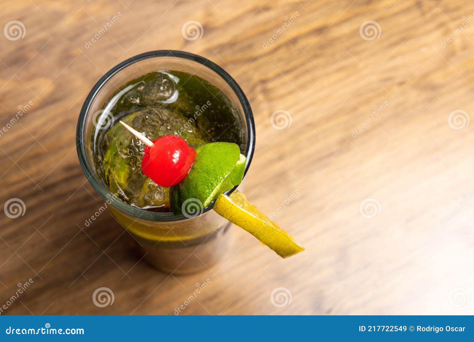 tropical cocktails on wooden background. frutal alcoholic cocktails. colorful drinks concept