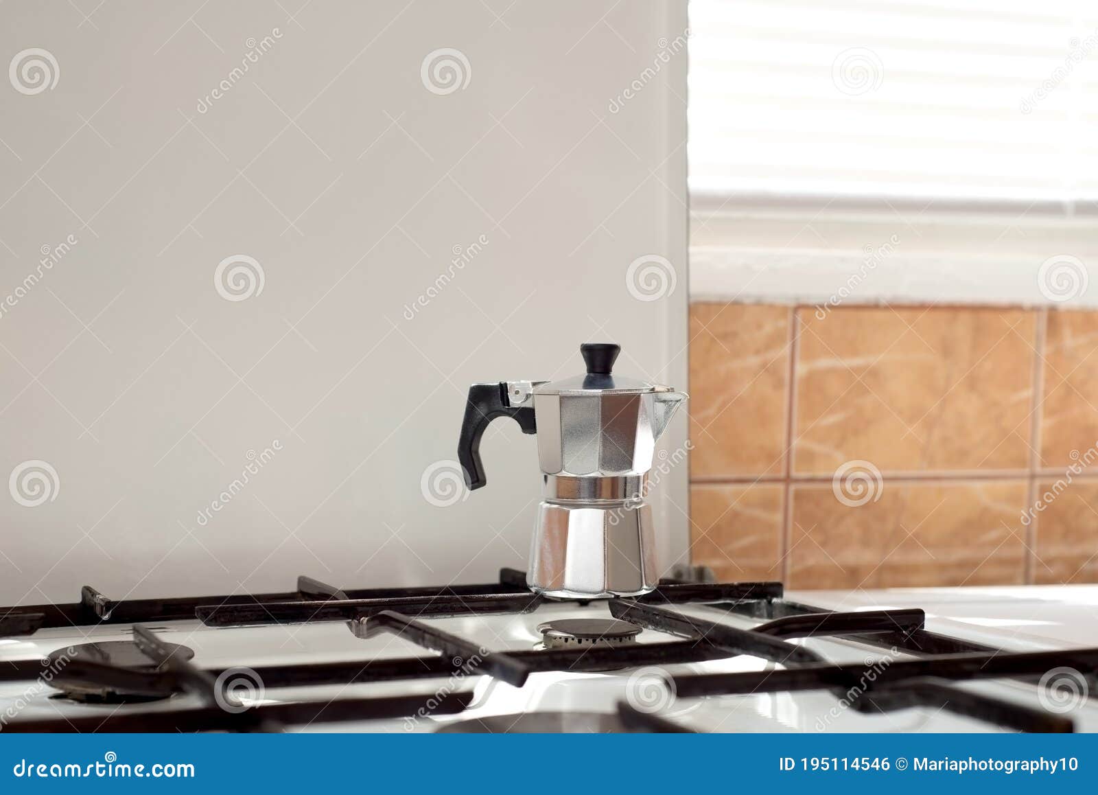 moka coffee pot on a gas stove