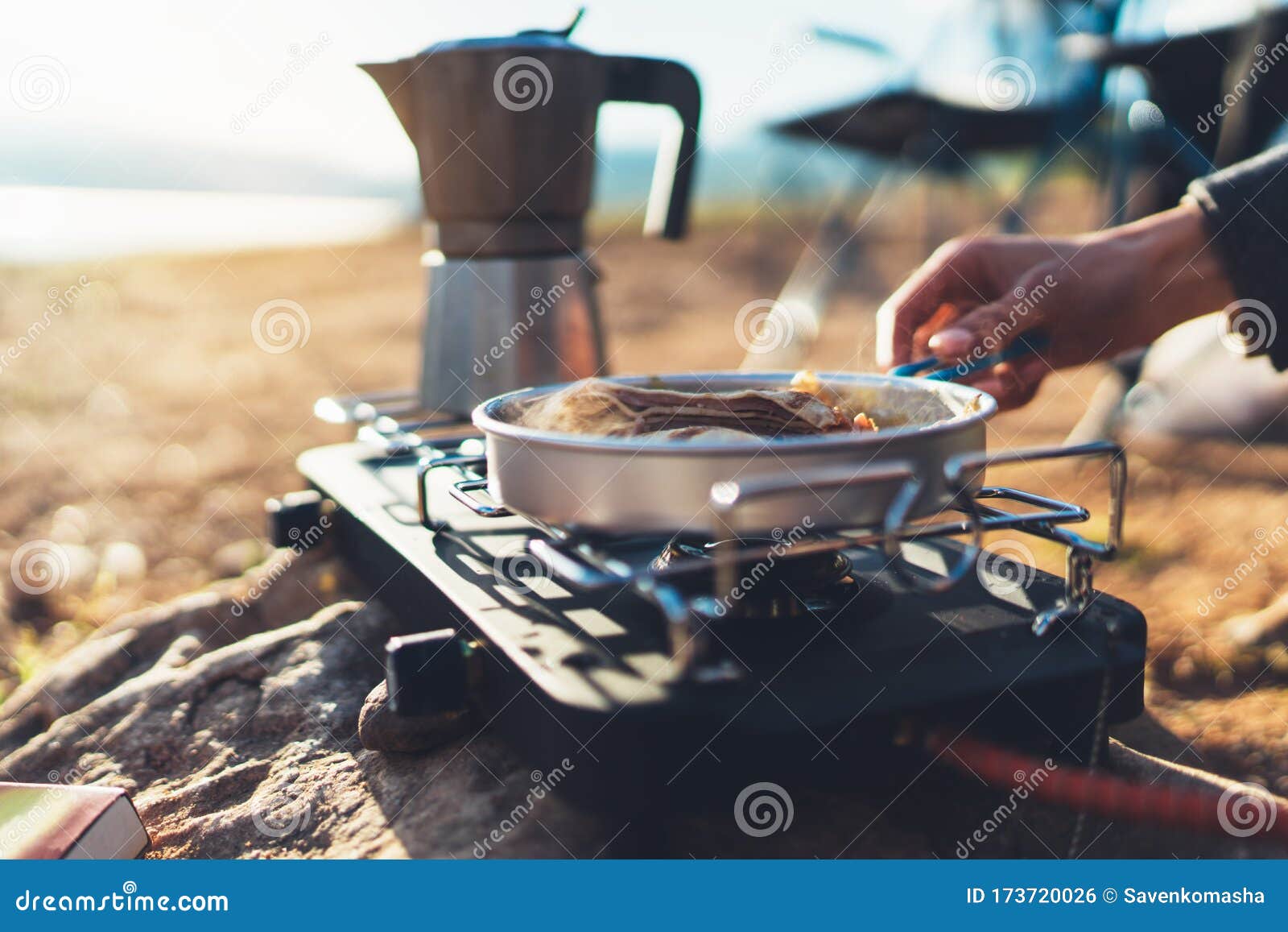 moka pot coffee campsite morning lifestyle, person cooking hot drink in nature camping outdoor, cooker prepare breakfast picnic