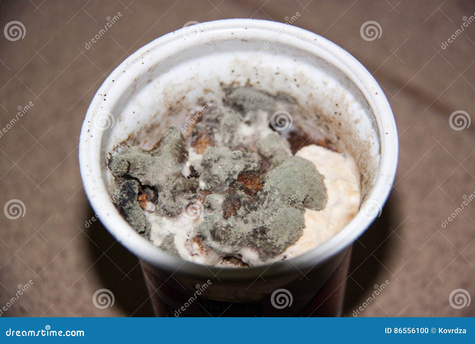 Moldy plastic cup on floor stock photo. Image of ingredient 86556100