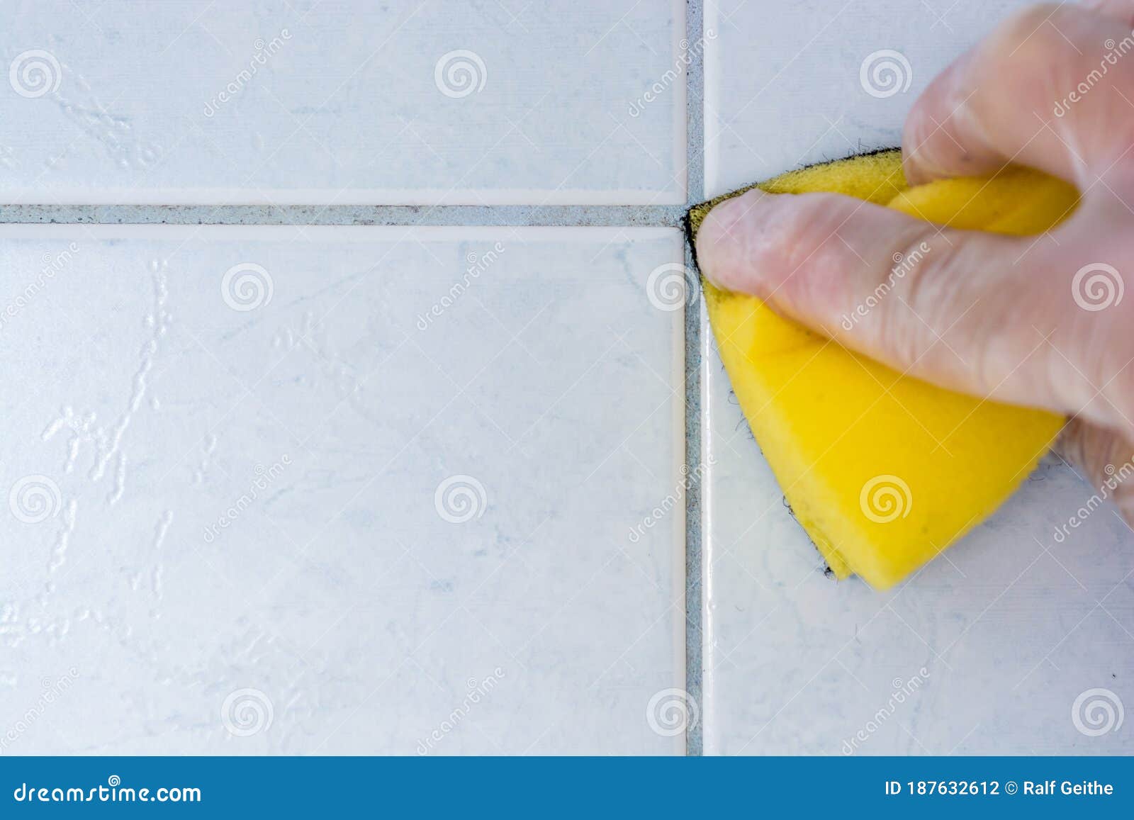 Cleaning of Moldy and Dirty Joints in the Bathroom with a Sponge Stock