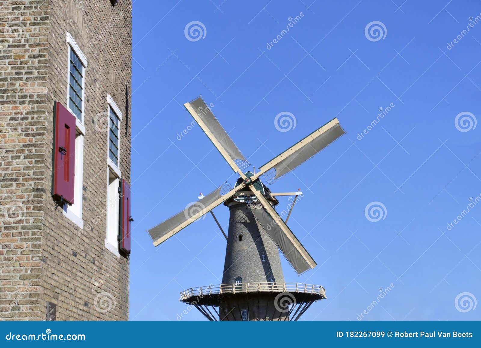 the molen de roos windmill in delft