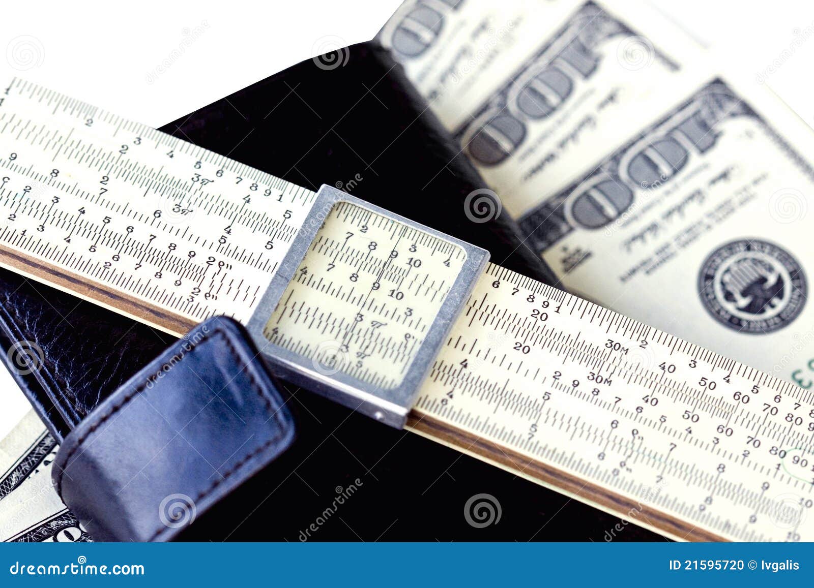 moleskin, scale ruler, and hundred dollar bills