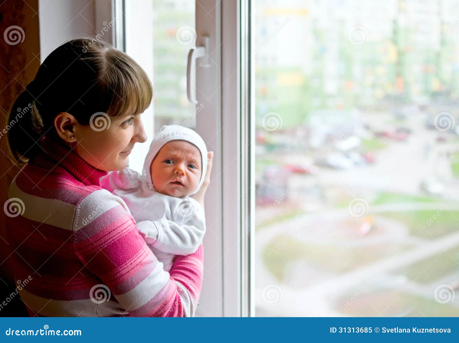 Mom with baby near window stock image. Image of holding 31313685