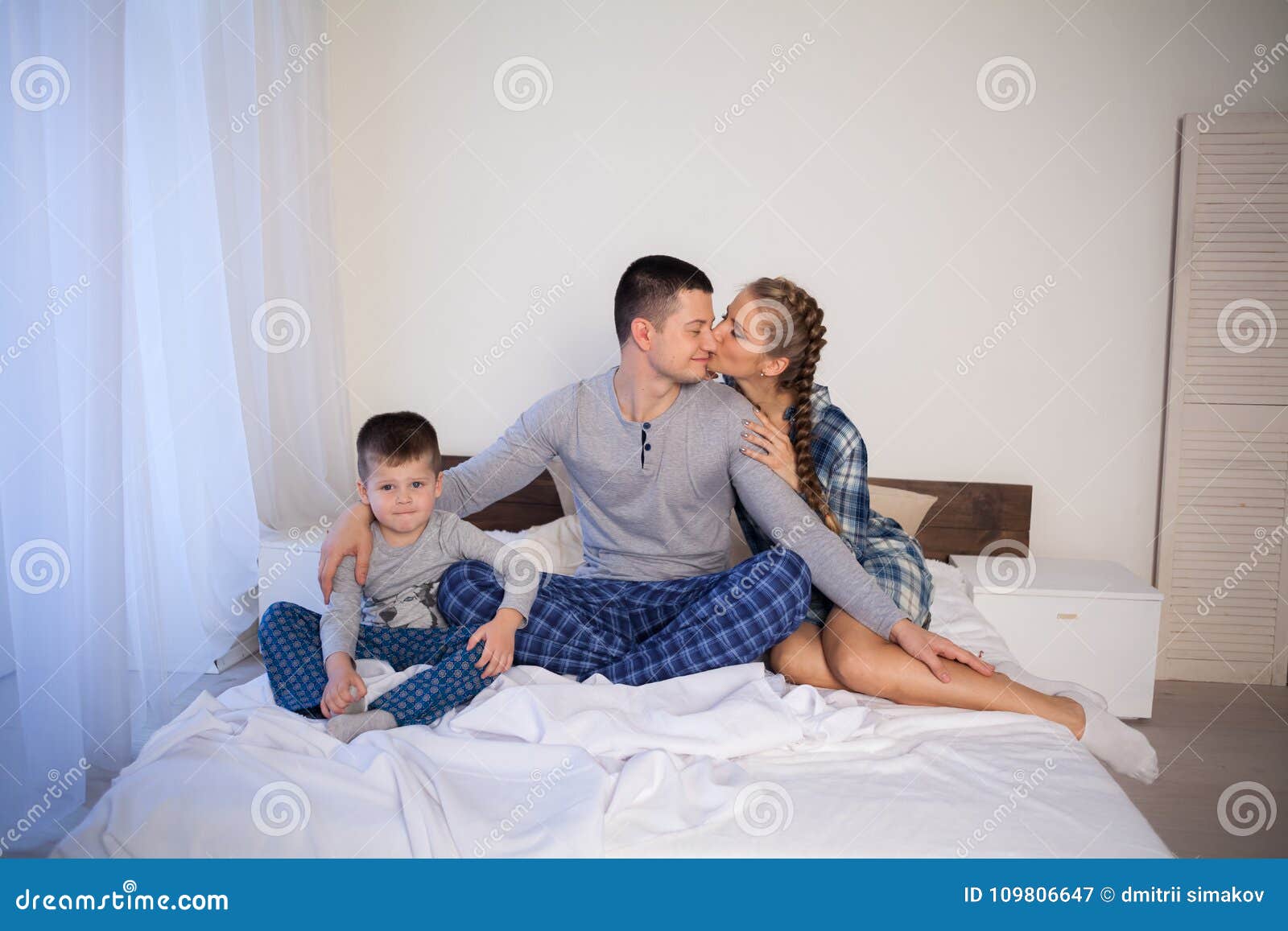 Mom Dad Son in the Morning in Bed Stock Image Image of laughing