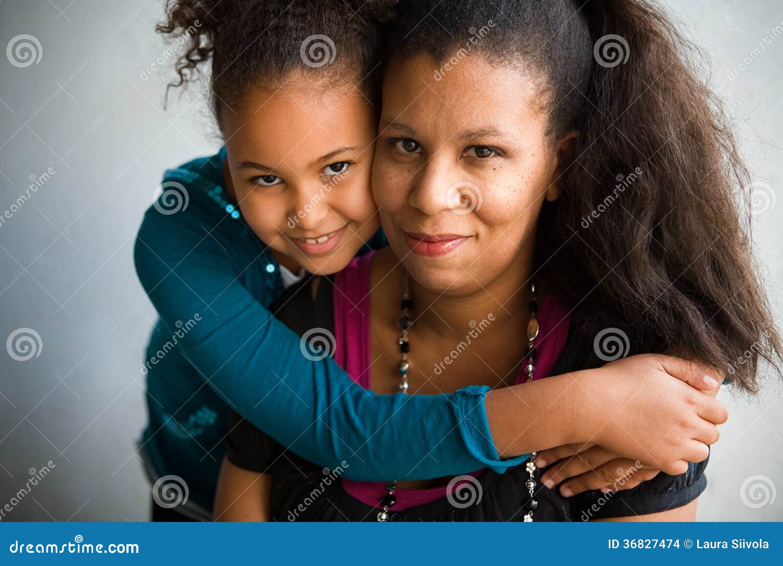 mom and daughter hug