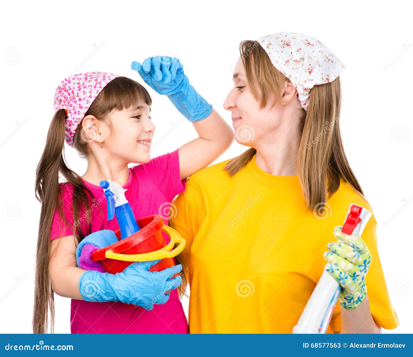 mom and daughter ready cleaned in the home.  on white