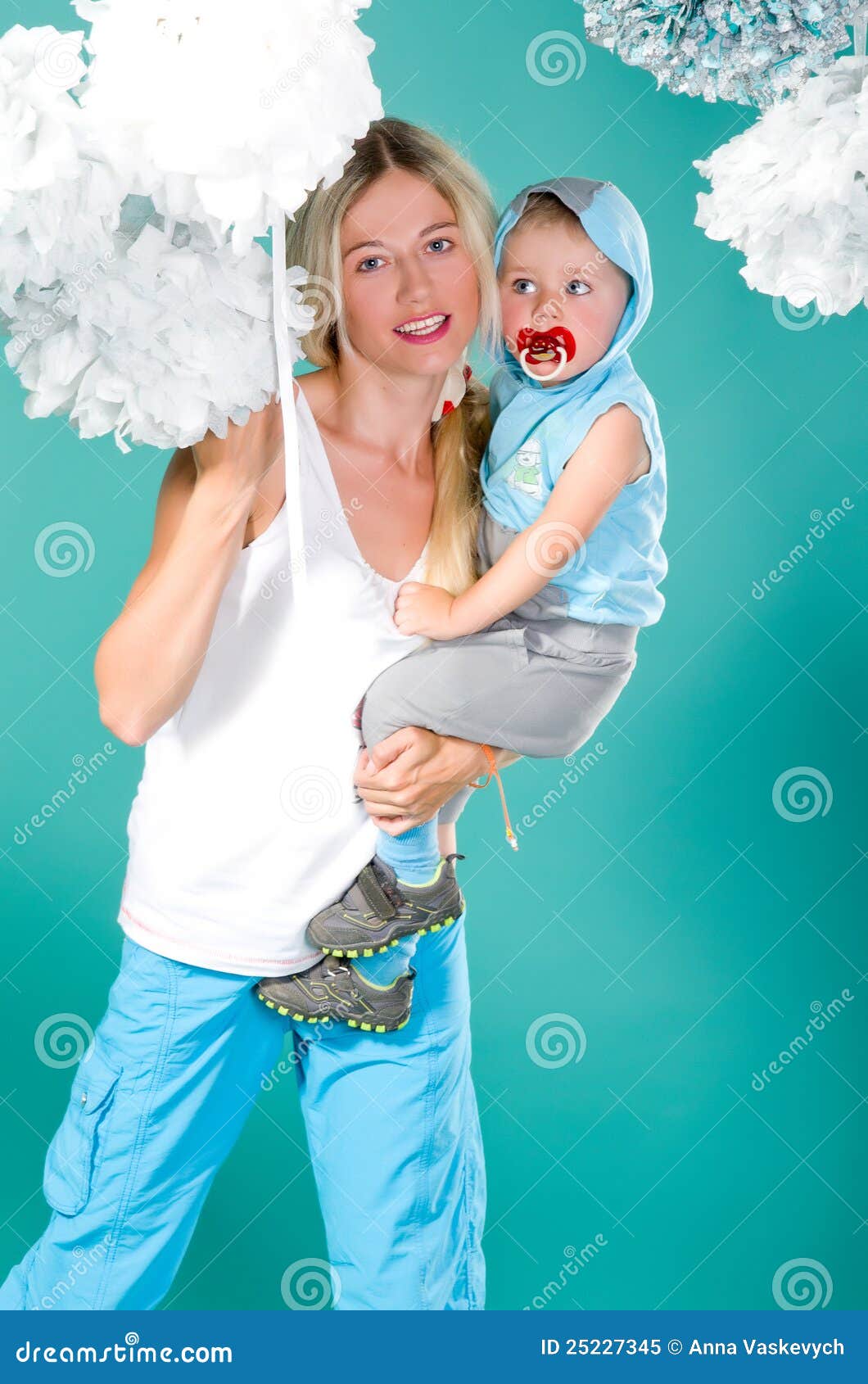 Mom Holds Her Son In Her Arms Stock Image Image of smile, background