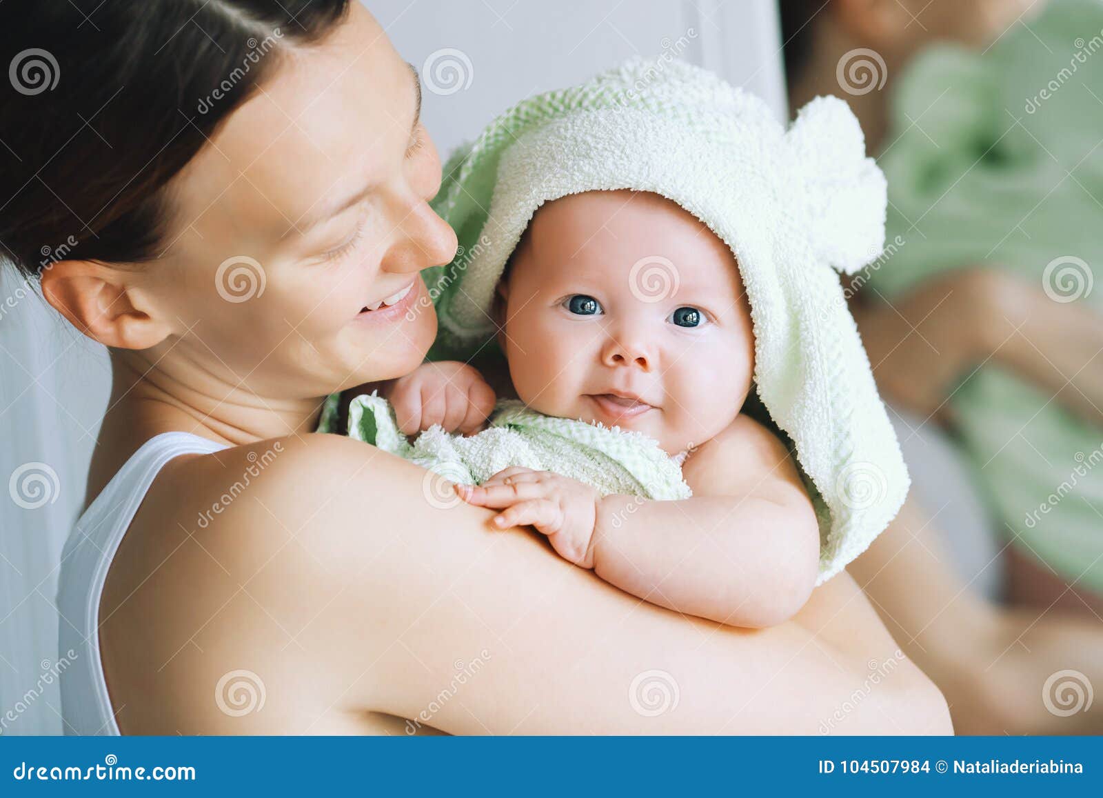 cutest baby after bath with towel on head.