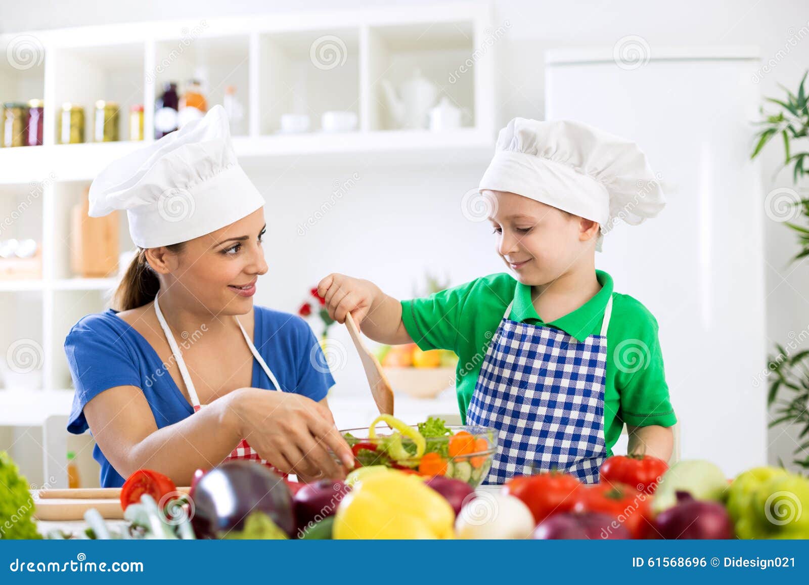 Mom with Kid Making Lettuce Stock Photo Image of healthy, lettuce 61568696