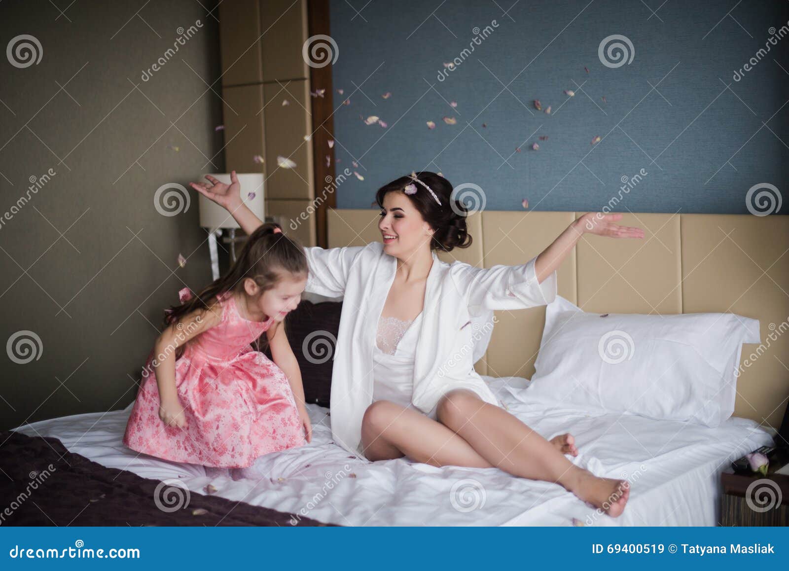 Mom Plays With Her Daughter On Bed And Hugging Stock Image Image Of