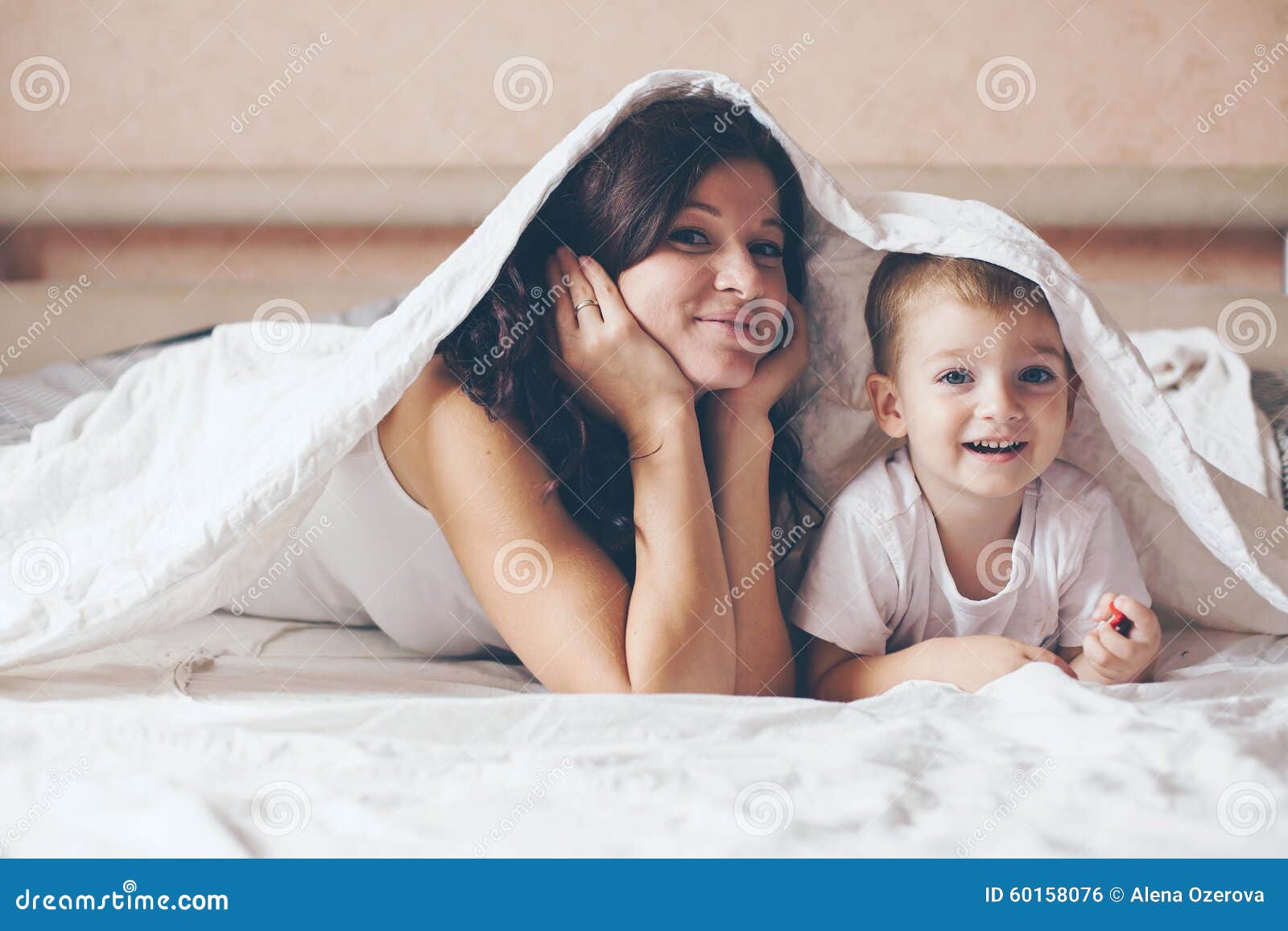 Mom Relaxing with Her Little Son Stock Photo - Image of child, sanday ...