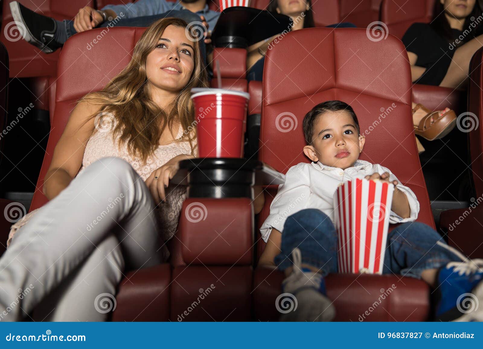 Mom and Son on a Movie Date Stock Image - Image of leisure, audience