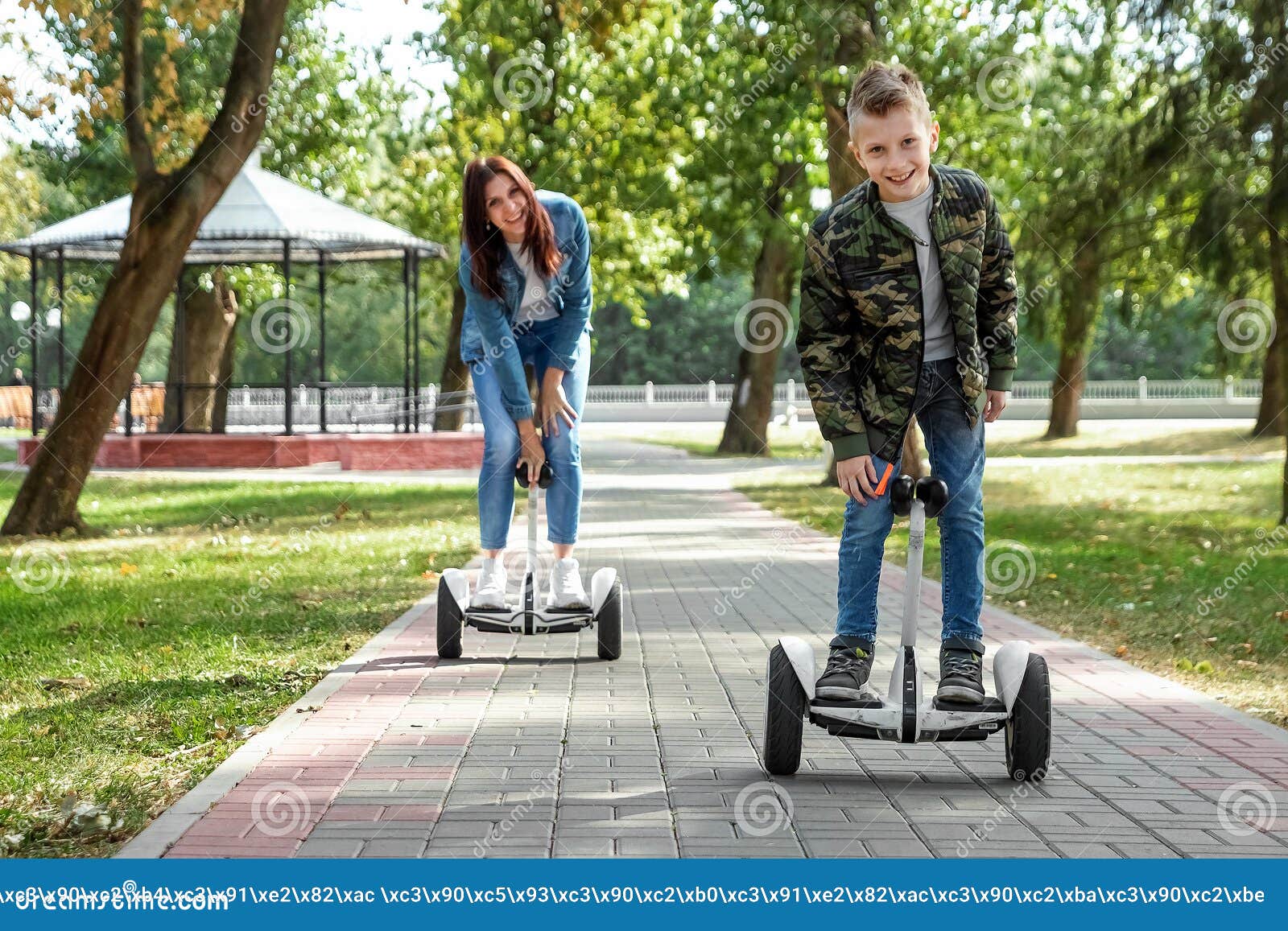 Mom and Son Ride a Hoverboard in the Park, a Self-balancing Scooter. Active Lifestyle Time with Baby Technology Future Image - Image of entertainment, mini: 158662315