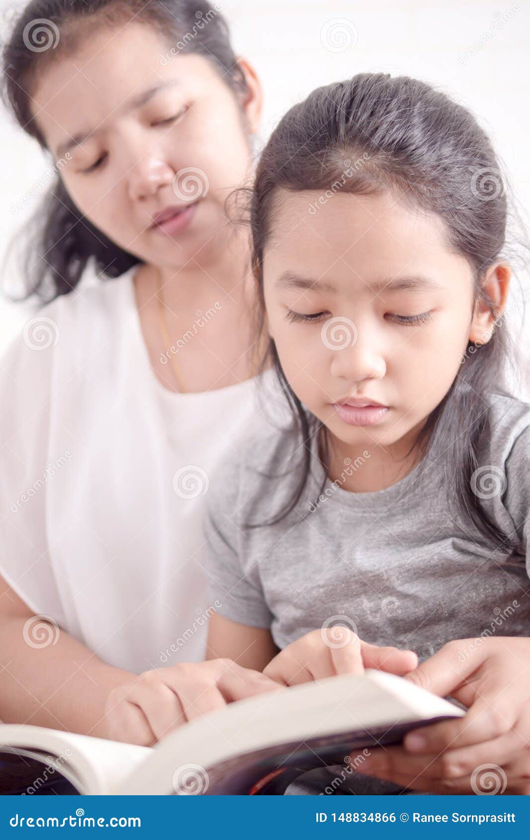 asian mom teaches daughter