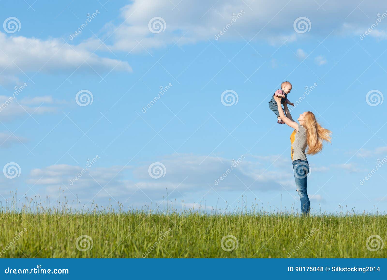 Mom throws baby up stock photo. Image of freedom, park 90175048