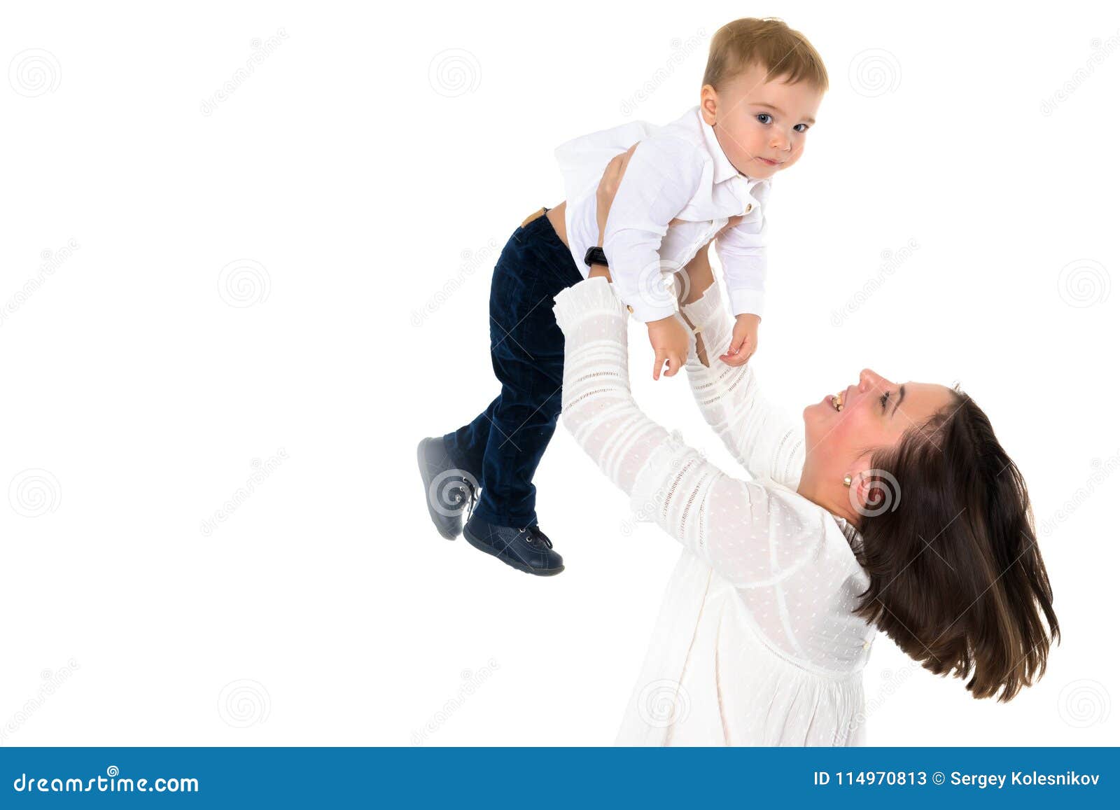 Mom throws her son up. stock image. Image of cute, people - 114970813