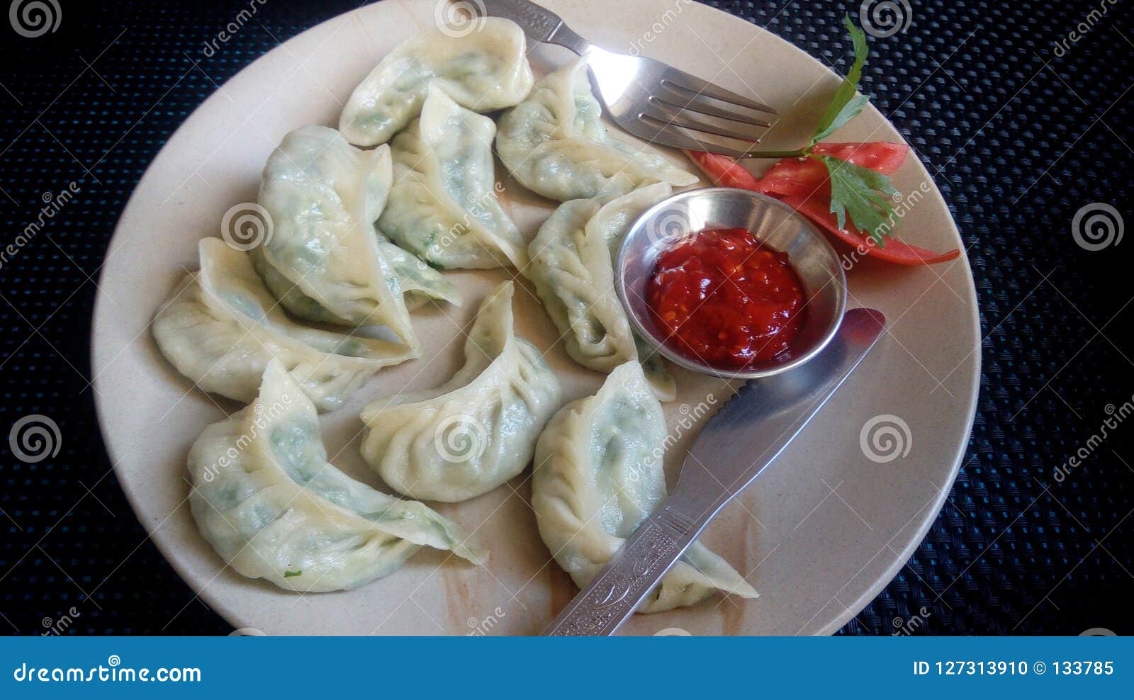 Momo on a plate stock photo. Image of boiled, cooked 127313910