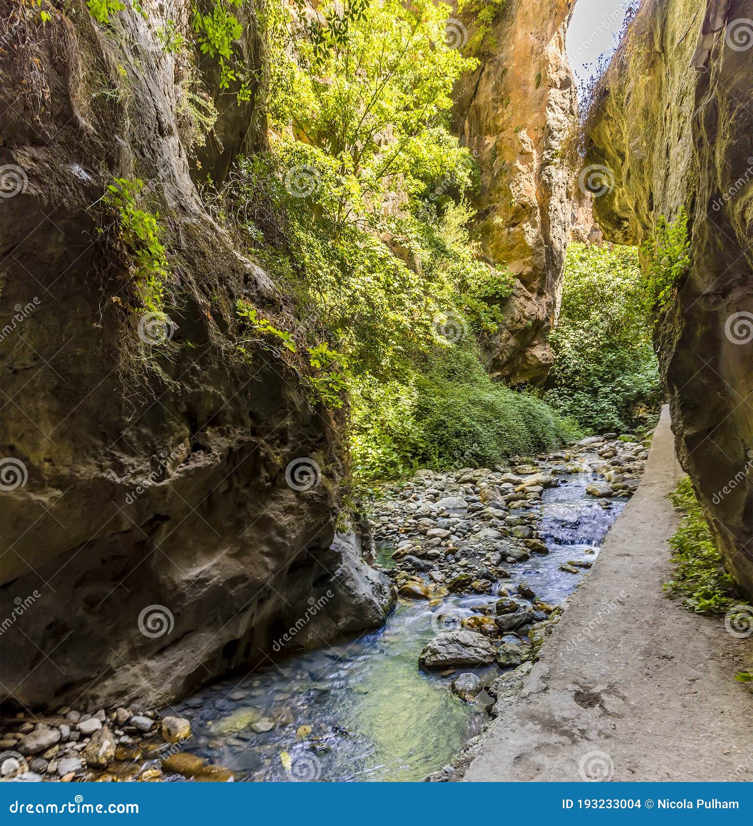 The Monachil River Flows Exits a Tunnel into a Gorge in the Sierra 