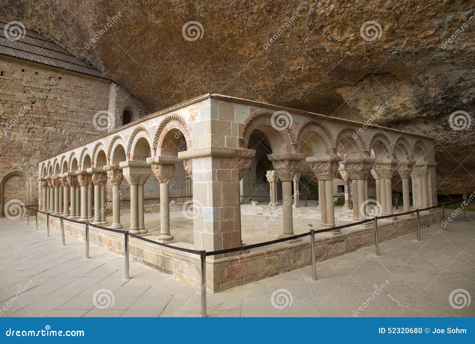 the monastery of san juan de la pena, jaca, in jaca, huesca, spain, carved from stone under a great cliff. it was originally buil