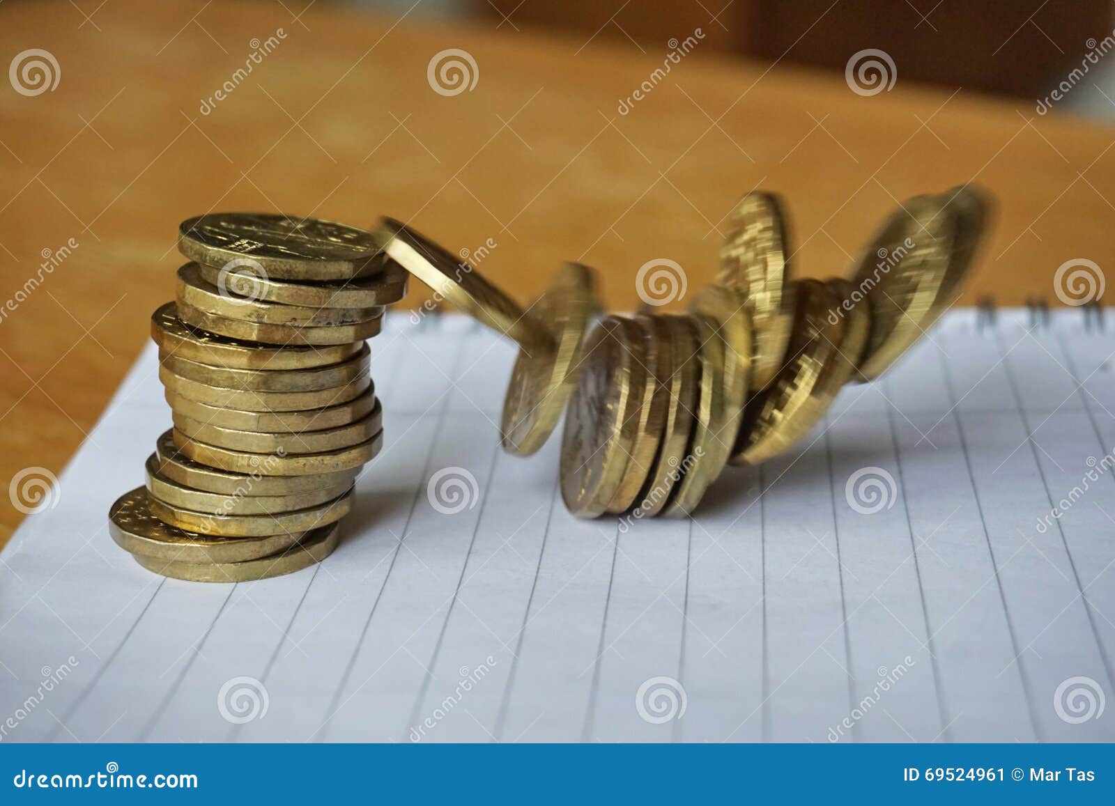money background of falling pile of coins as a  of financial deterioration