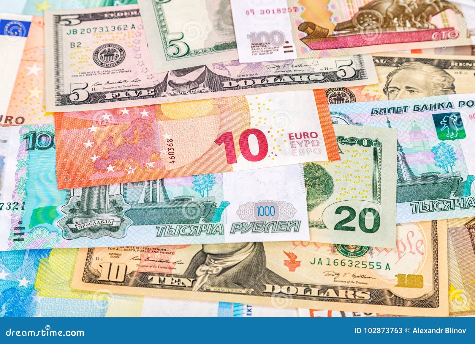 Background From Paper Currency Of Euro American Dollars A Background From Paper Currency Of Euro American Dollars A