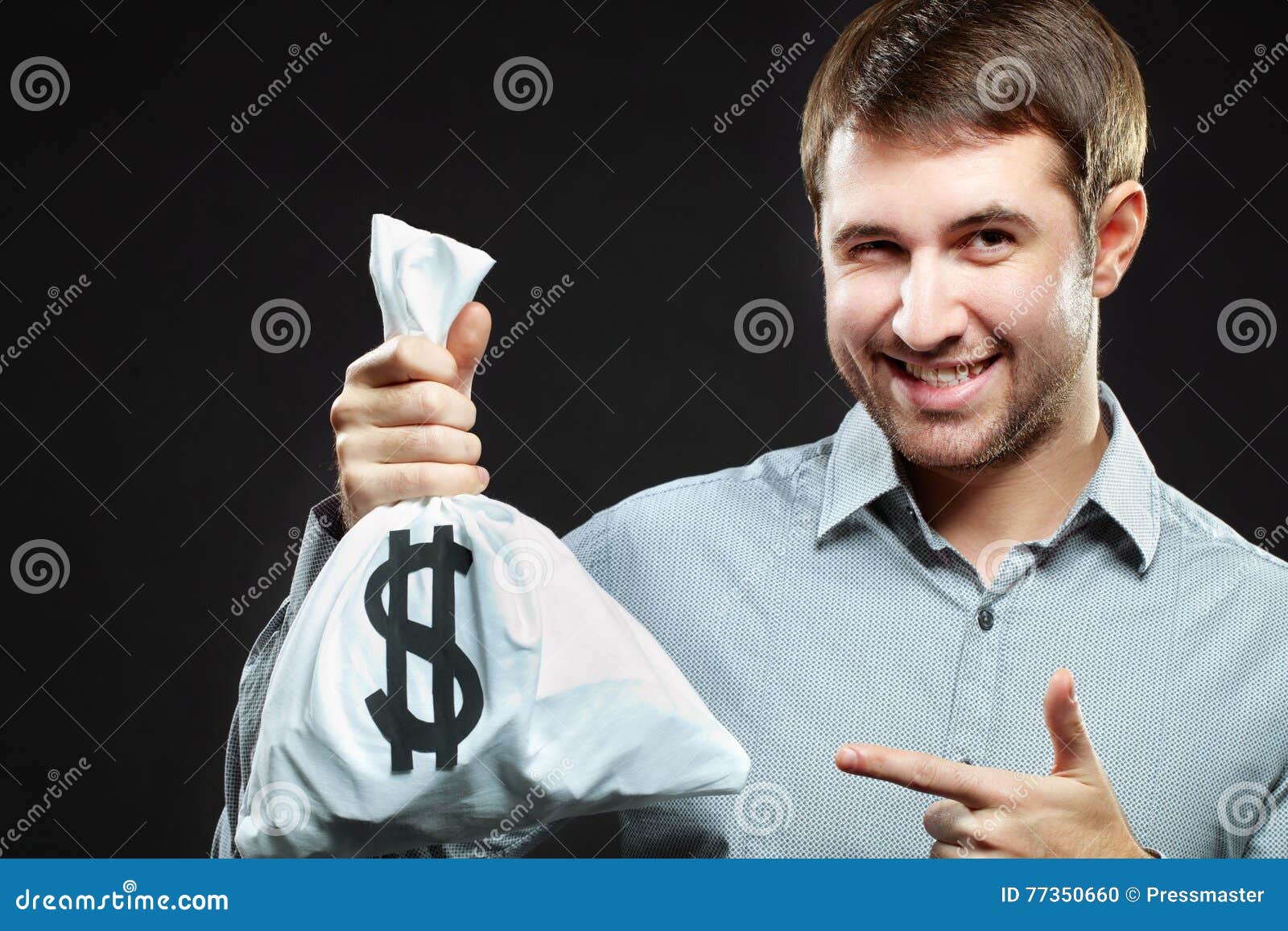 money-bag-smiling-man-holding-winking-77350660.jpg
