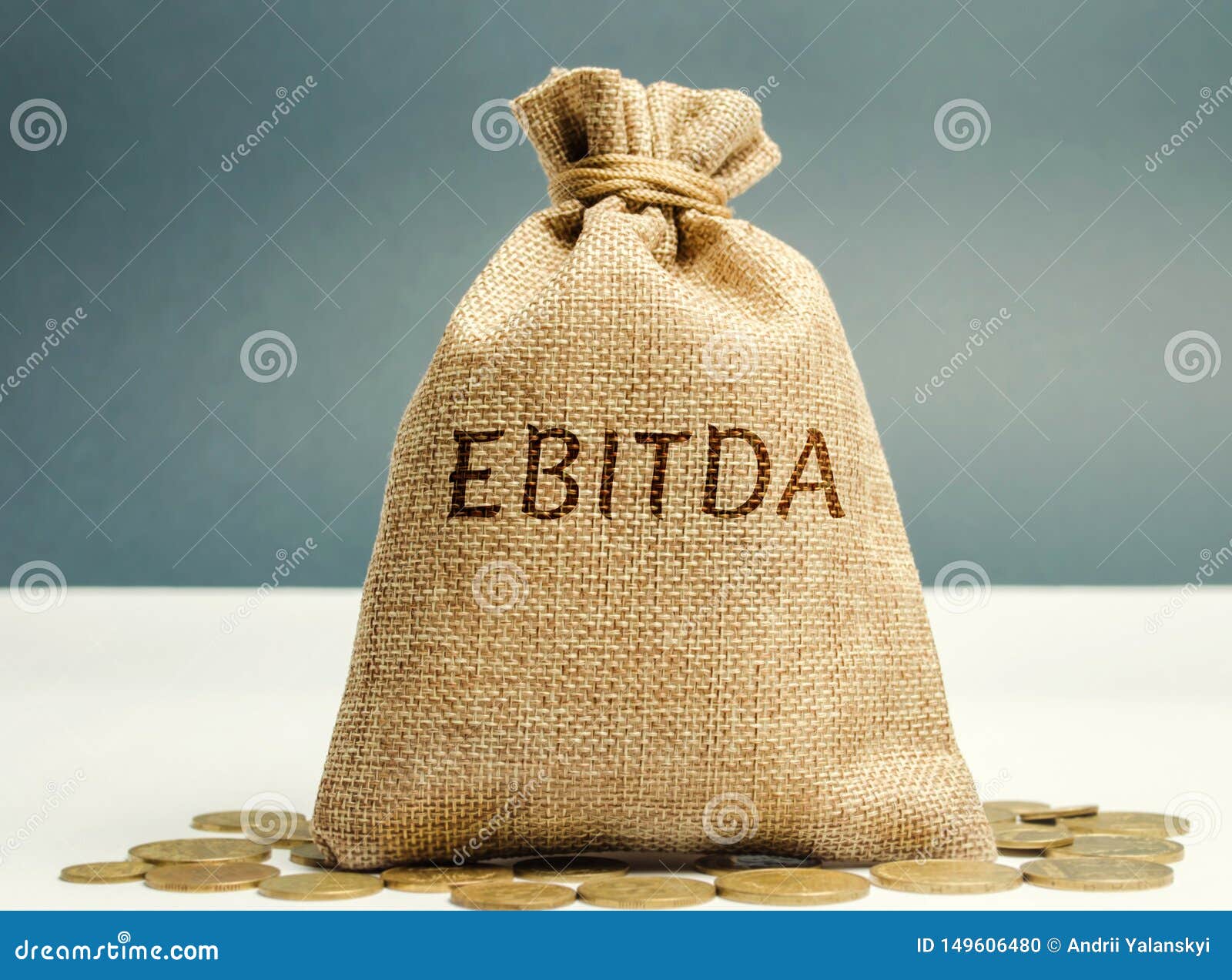 money bag with the word ebitda. earnings before interest, taxes, depreciation and amortization. financial result of the company.