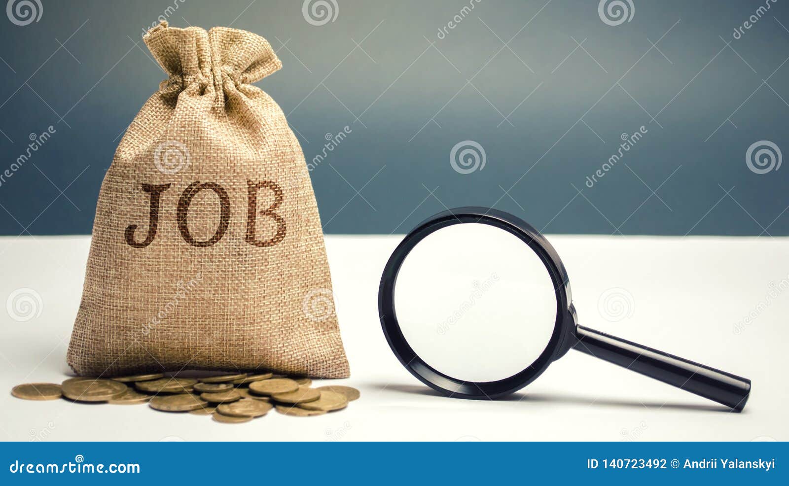 money bag with the word job and a magnifying glass. work search concept. available job vacancies. high unemployment. applicants