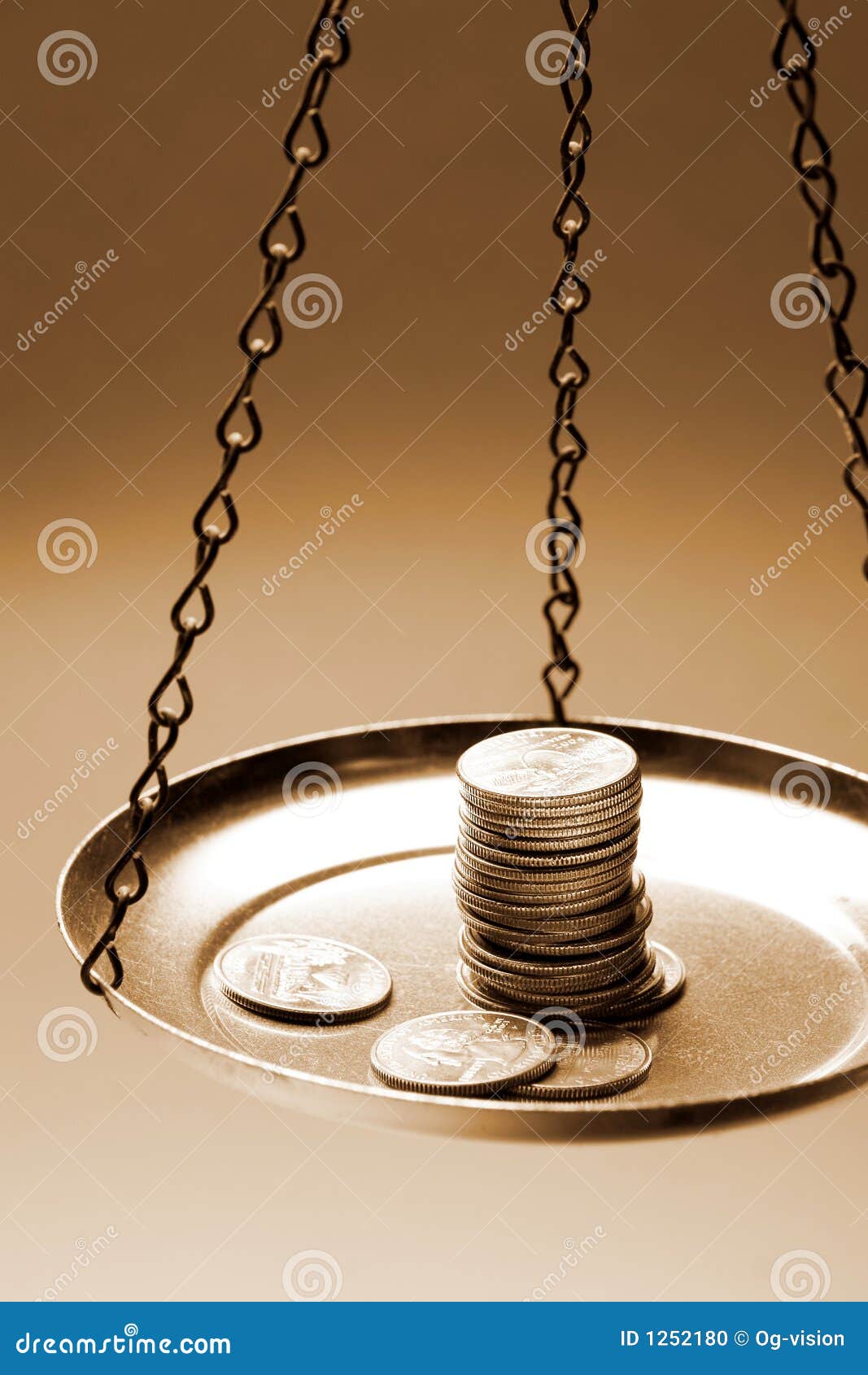 Businessman Covering Stacked Coins On Golden Weighing Scale At Wooden Table  Stock Photo, Picture and Royalty Free Image. Image 84268953.