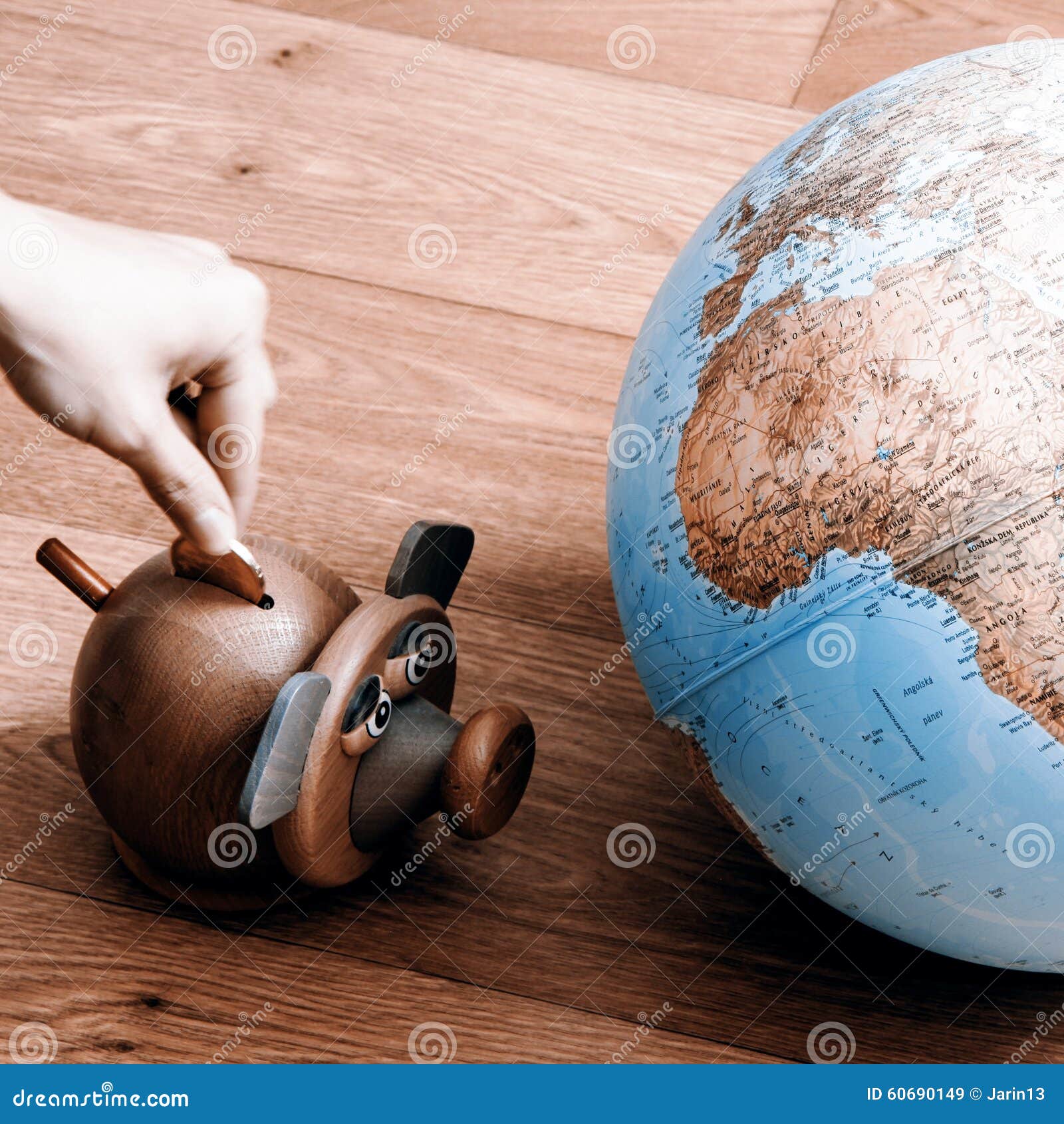 globe as money box - mappamondo a salvadanaio Stock Photo