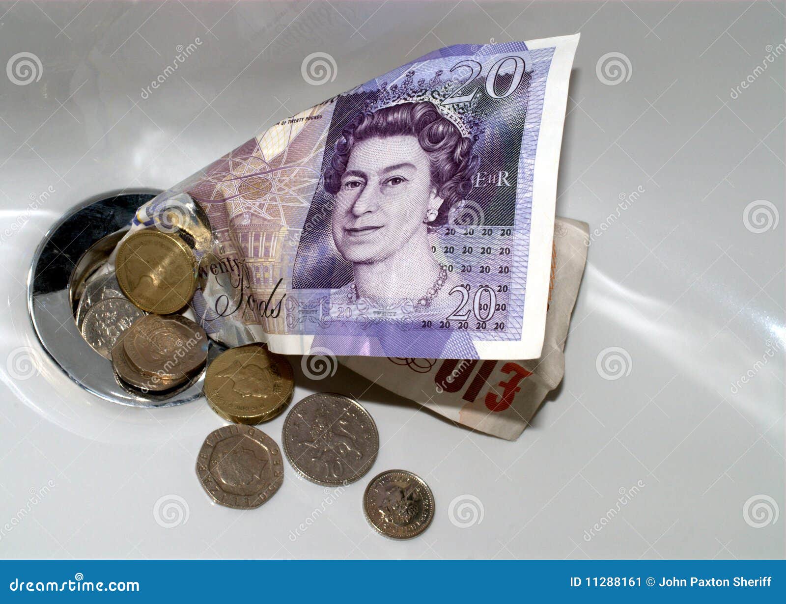 Money Down the Drain stock image. Image of financial 11288161