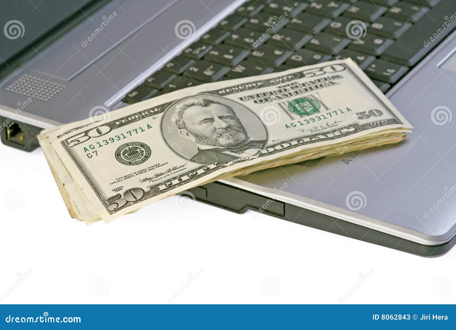 Money on laptop stock image. Image of closeup, media, desk - 8062843