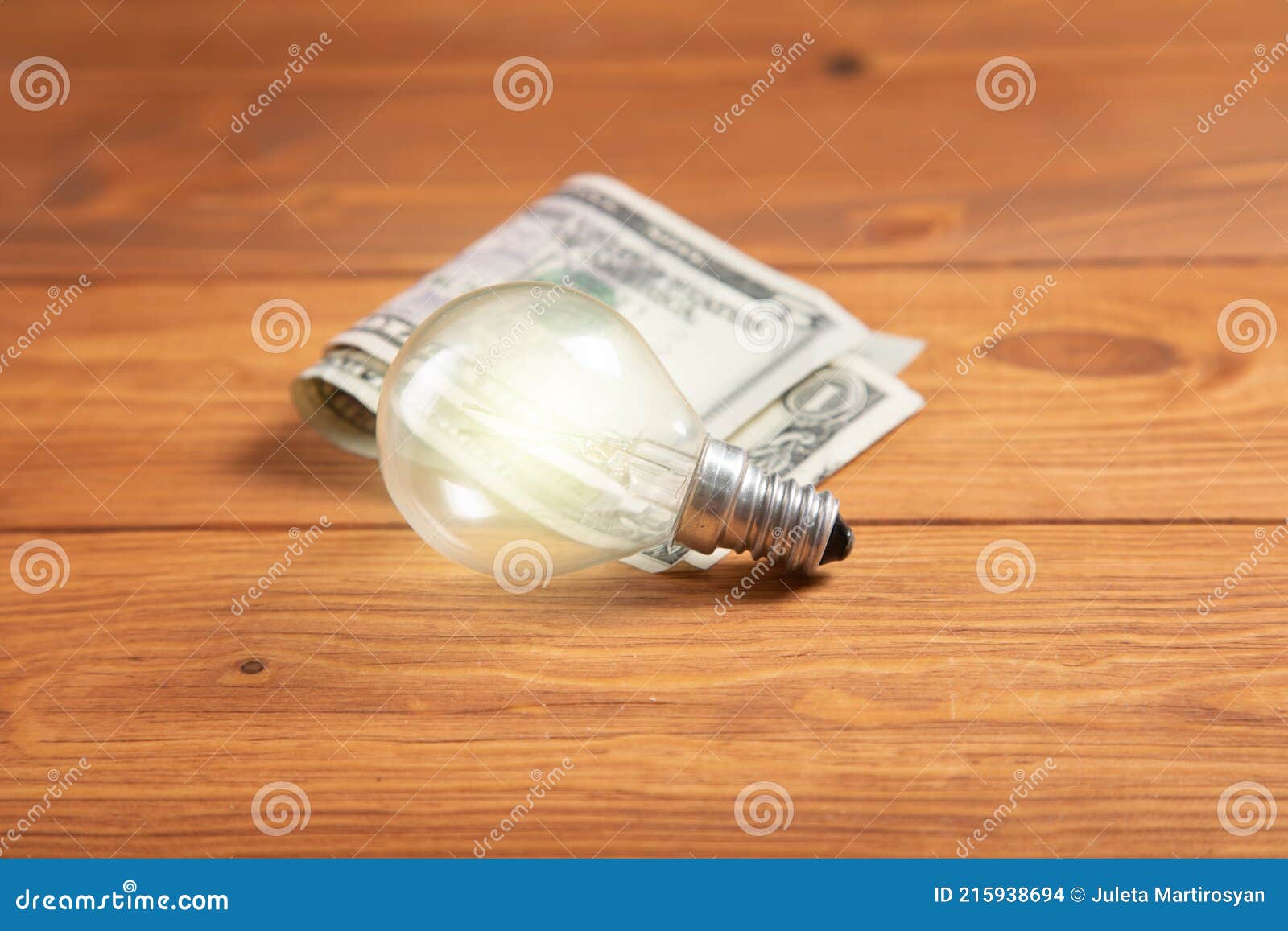 Money and Light Bulb on the Table Stock Photo Image of save, sign