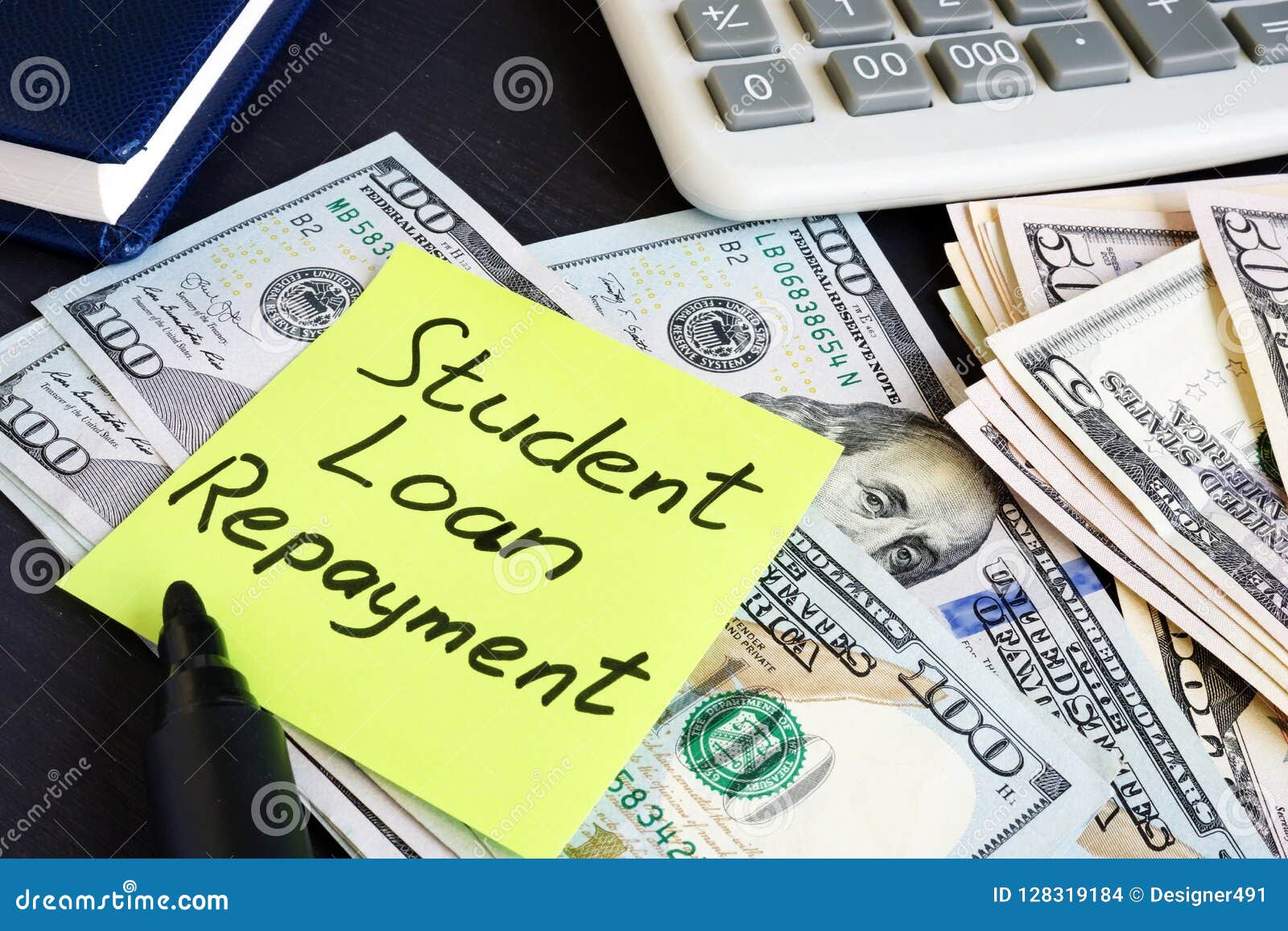money for student loan repayment on a table.