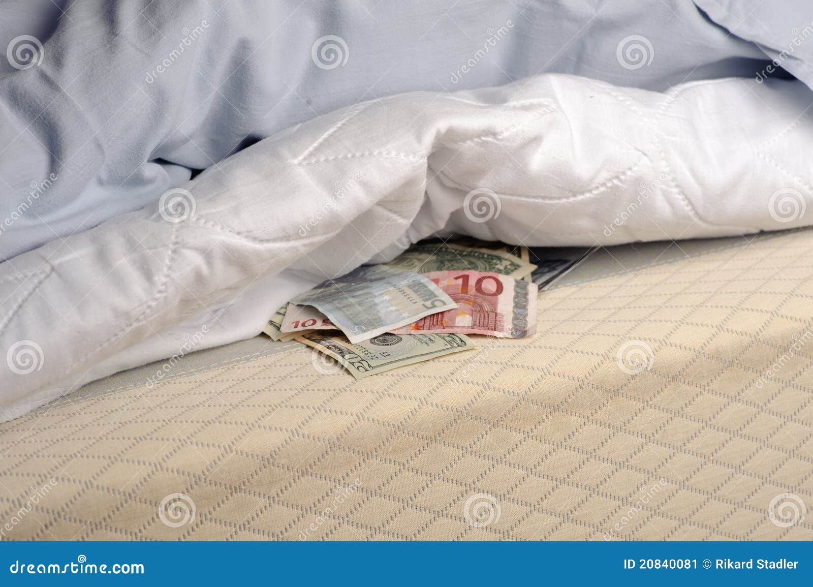 Money under the mattress stock image. Image of american 20840081