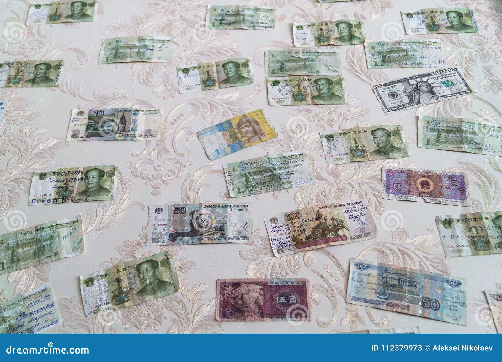 money on the wall gratitude of visitors editorial stock photo