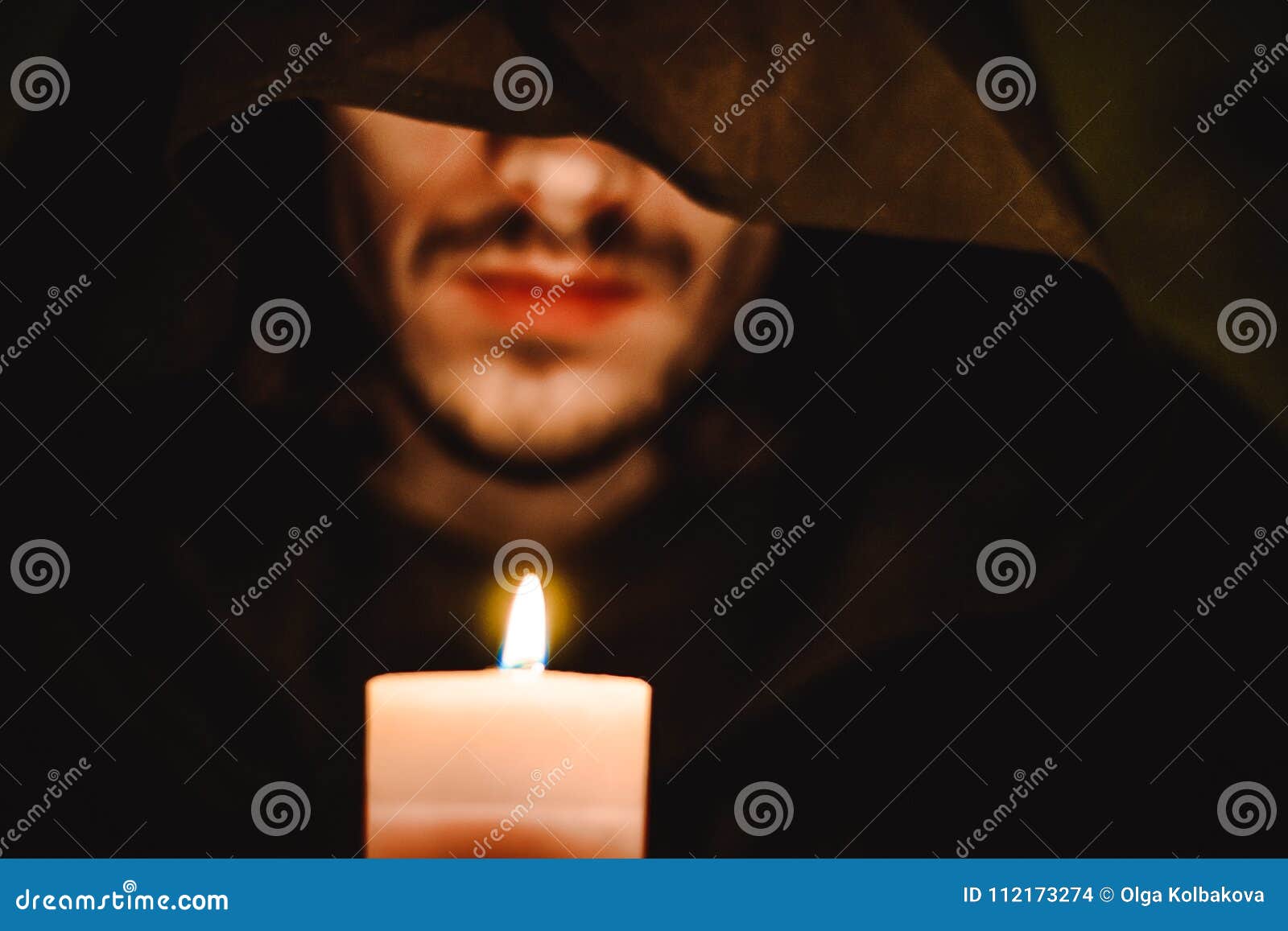 A monk with a candle stock photo. Image of darkness 112173274