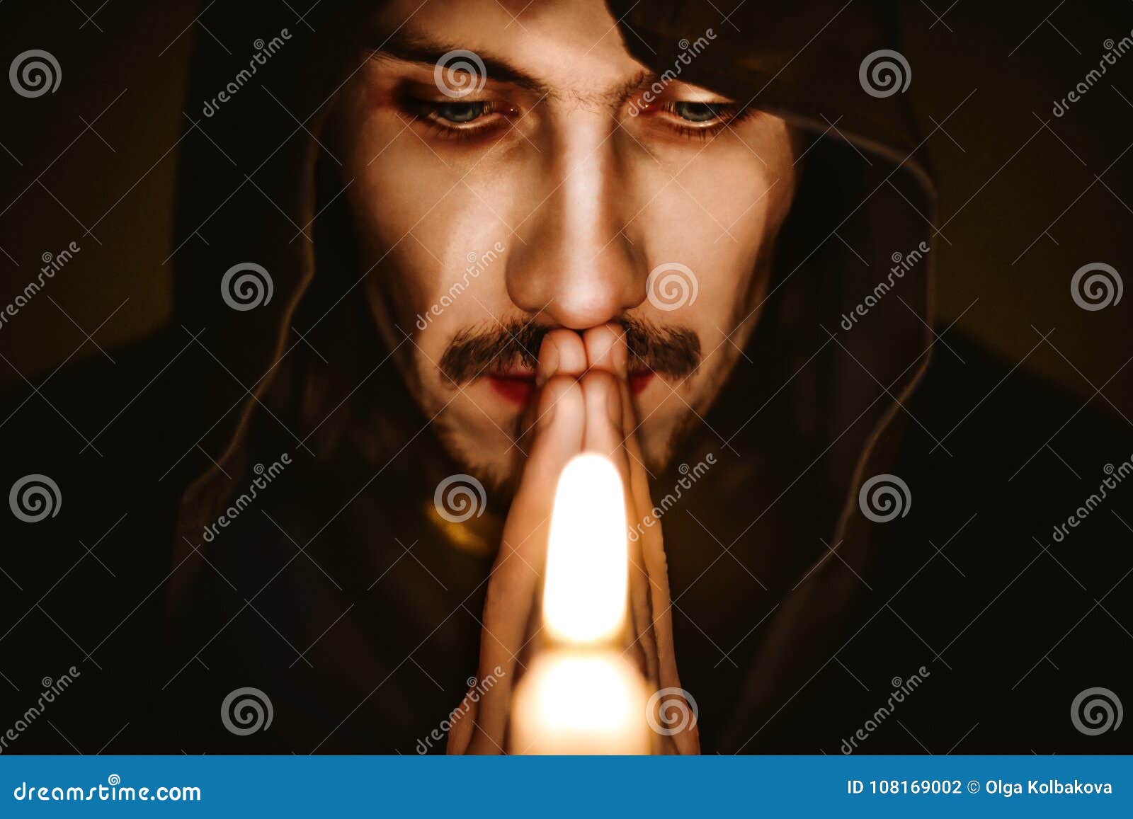 A monk with a candle stock photo. Image of holy, fire 108169002